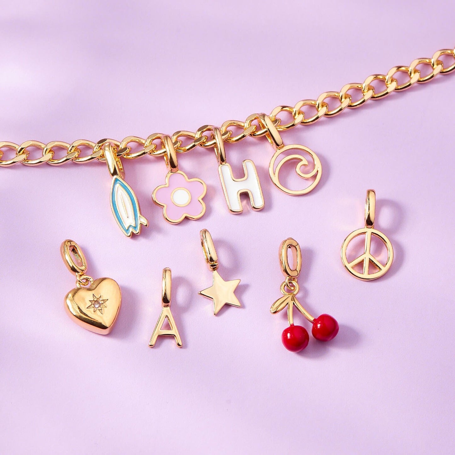Harper Starburst Heart Charm